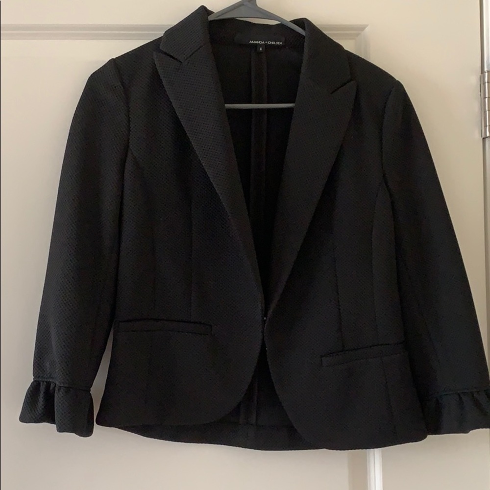 Black blazer w/ cropped length ruffle sleeves